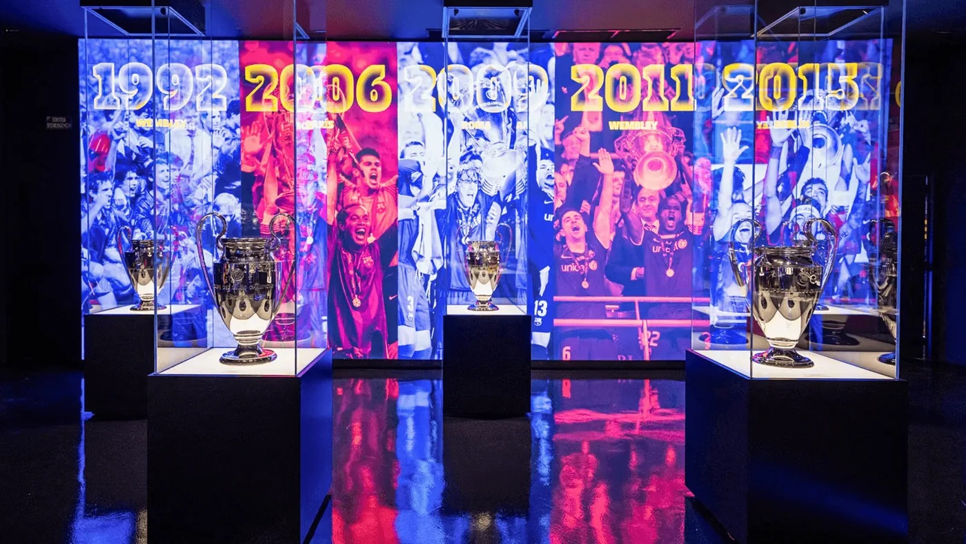 Trophy displays and digital screens at the Barça museum