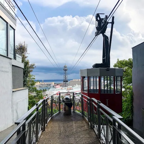 Path and red cabin at a port cable-car station