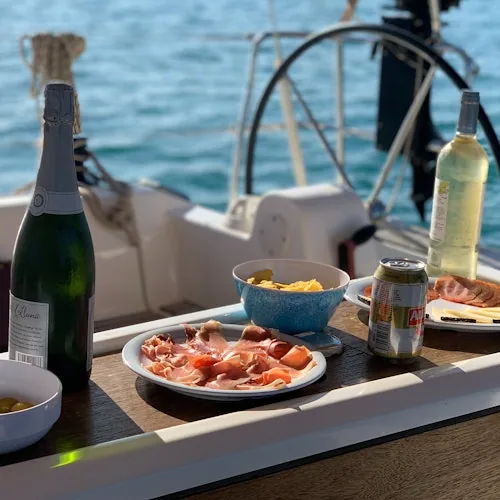 Drinks and light snacks on the deck of a Barcelona sailing yacht