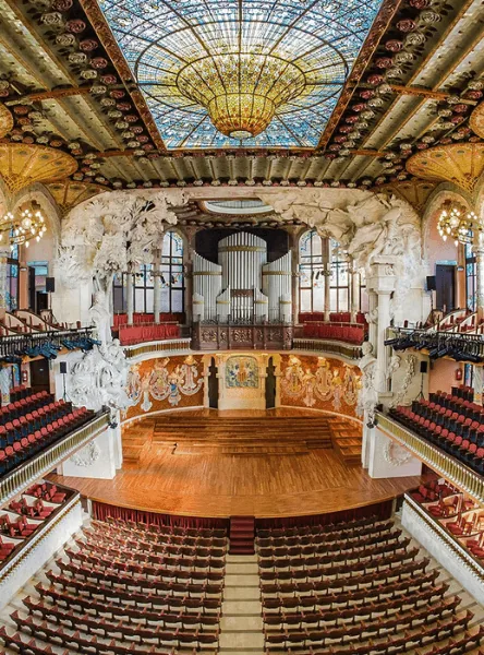 Ornate ceiling and concert-hall balconies at Palau de la Música