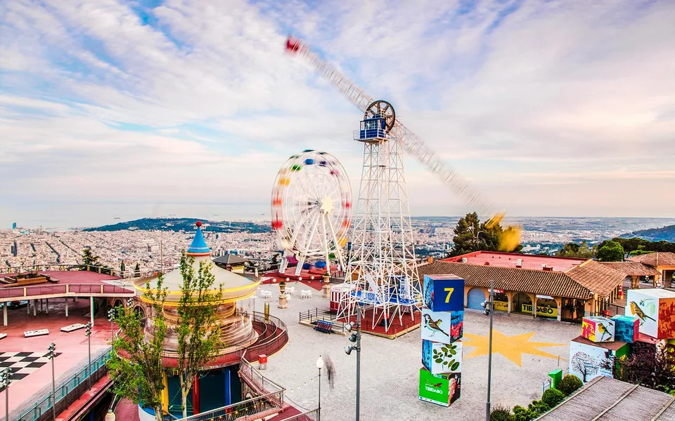 Ferris wheel and panoramic rides at Tibidabo above Barcelona